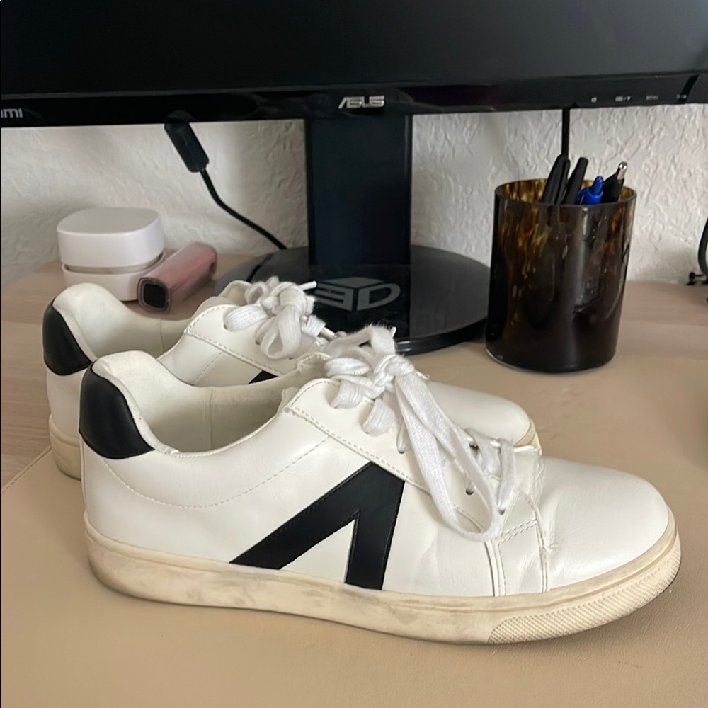 White Sneakers with Black Accents
